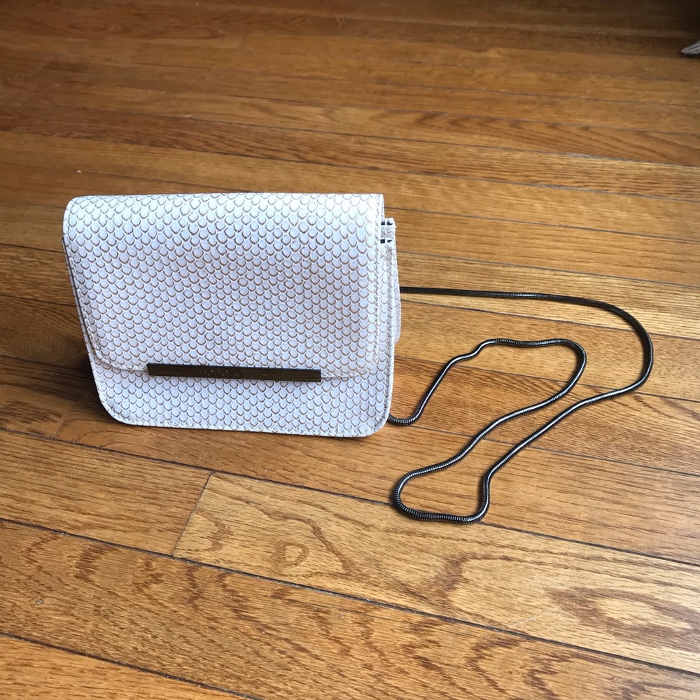 LIKE NEW BCBG snakeskin pattern purse